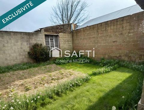 Maison individuelle avec jardin et dépendances.