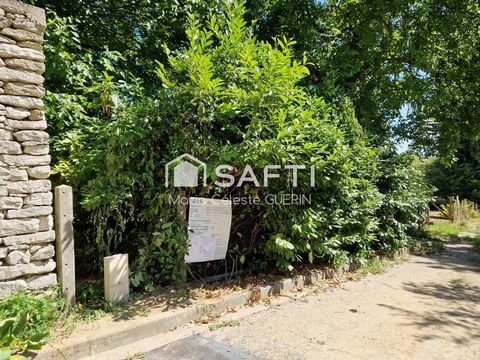 Terrain viabilisé, plat et vue dégagée au cœur du village !