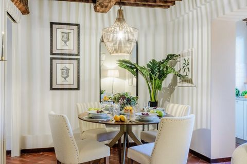 This stylish and serene one-bedroom apartment nestled within the historic walls of Lucca, offering the perfect blend of modern comfort and old-world charm. Ideal for couples or solo travelers, this 50 m² retreat is thoughtfully designed with a cozy l...