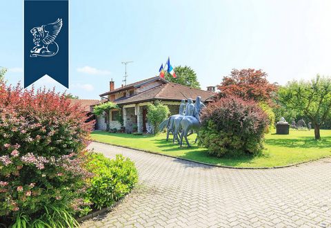 This stunning luxury estate enveloped by nature is for sale near Varese, Lombardy. This property is made up of a gorgeous villa, two apartments, a horse stable, and a vast park sprawling over 22,000 m². The two-floored villa is made up of an entrance...