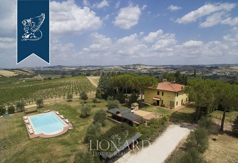 This beautiful farmhouse with swimming pool for sale is situated in a truly mesmerising setting in the province of Florence. The two-floored farmhouse sprawls over roughly 320 m². On the ground floor there are an entryway, an airy living room with bi...