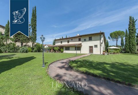 This luxury house located just a few kilometres out of Florence is for sale. The property's 890m2 internal surface is currently divided into three large independent apartments, all spread over two floors. On the ground floor there are the living...