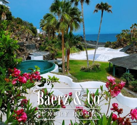 This stunning villa is one of the most unique properties in the south of Tenerife, just 30 meters from the coast in Golf del Sur. This property has a total of 3,709 m2 of land and 426 m2 of living space. On the ground floor there is an elegant living...