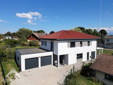 TO VISIT QUICKLY The ADN Immo agency exclusively offers you this very pretty detached house of 225m2 in the town of Saint-Genis-Pouilly. Built on a plot of 850m2, it includes a large bright living space including a fully equipped open kitchen, 6 spac...