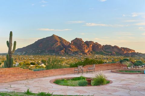 Seller Financing Available! Incredibly Rare Opportunity to own a block construction home with tall ceilings on 2.8 Acres with Stately Views, eye level with: Iconic Camelback Mtn, Mummy Mtn, the Phoenix Mtn Preserve and McDowell Mtn, with sensational ...