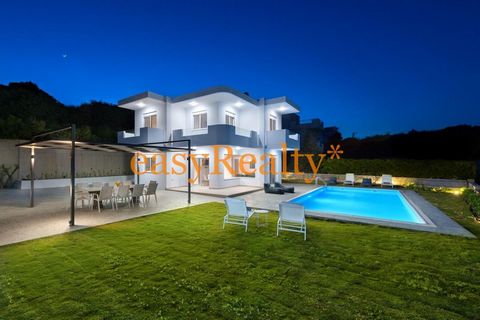 website: easyrealtyrhodes.com Property Description Situated on a hill, in a complex of five luxury villas, this luxury two-storey villa has unrestricted sea views while at the same time being just minutes away from it. Just above the famous Afandou b...