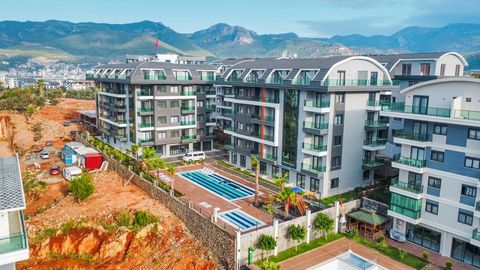 Large layout apartment in a modern complex This apartment is located in a picturesque and ecologically clean area of ​​Oba, Alanya. This area is famous for its green spaces and a calm atmosphere, ideal for comfortable living. Advantages of the comple...