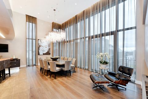 This exquisite, duplex penthouse has been impeccably finished to the highest standard to ensure ultimate luxury living. Situated on the eighth and ninth floors, this home has impressive views over London. The eighth floor comprises three generously p...