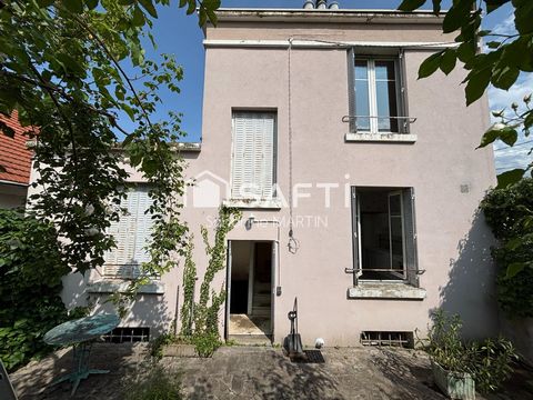 Maison T5,110m2, 2 garages, caves et jardin