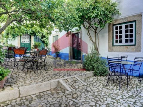 Historic house within the walls of Óbidos Castle. With enormous potential for various uses, such as housing, local accommodation and catering. Equipped with pellet's stove and central heating. Cosy 100sq.m páteo and annex ready to function as Local A...