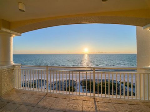 PENTHOUSE, 2 CAR GARAGE, EXTERIOR DEEDED PARKING SPOT, 2 STORAGE CLOSETS & NEW IMPACT WINDOWS! Experience the pinnacle of coastal living in this remarkable Gulf-front penthouse that lives like a home! With awe-inspiring views from every room, designe...