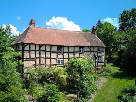 An early 17th century Grade II Listed detached village home, with gardens and grounds extending to approximately 1 acre in all, including a large detached barn which provides great potential for conversion into additional accommodation (subject to th...
