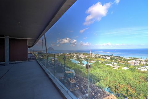 Nestenn bietet Ihnen dieses außergewöhnliche Apartment mit 3 Schlafzimmern auf den Höhen von Tamarin mit atemberaubendem Blick auf das Meer. Zugänglich für Ausländer, Aufenthaltserlaubnis bei Erwerb. BUCHEN SIE IM NOVEMBER 2024. Unter den 52 Einheite...