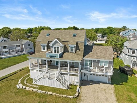 This spectacular 2013 colonial located in Sand Hills showcases the best in craftsmanship and luxury living. The radiant-heated bathroom floors, coffered ceilings, and gas fireplace crafted from beach stones highlight the attention to detail in this h...