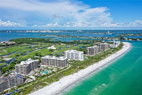 Perched on the eighth floor of Building III in a tranquil south corner location, this sun-drenched Sanctuary residence offers breathtaking panoramic views of Sarasota Bay and downtown's skyline through newly installed (2023) impact glass sliders and ...