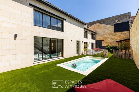 Located in the highly sought-after area of Bordeaux Bastide, in the immediate vicinity of schools, this charming stone house of approximately 250 m2 on the ground has been completely rehabilitated and benefits from a terrace, a garden, a swimming poo...