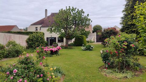 Maison de caractère avec grange et jardin paysager