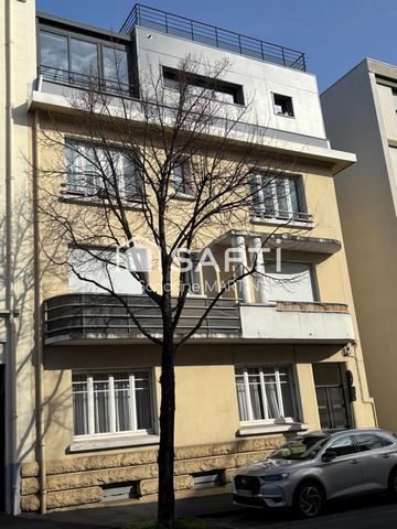 Appartement T3 , 67m2, RDC surélevé , cave et courette commune