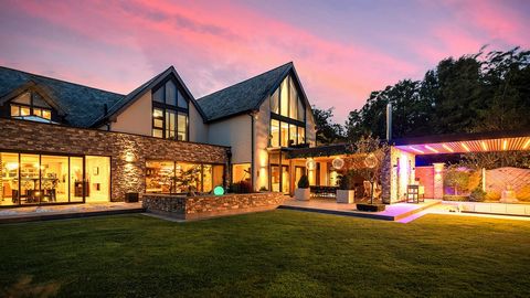 Nestled behind electric gates The Courtyard is an impressive 6 bedroom detached property offering over (6700 sq ft) of luxury accommodation. Designed by the multi award winning architect Tony Holt the design exemplifies the perfect balance between op...