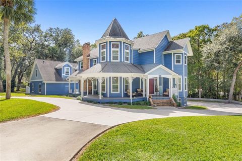 Magnificent Victorian that dreams are made of and this one has been completely updated and renovated including Pella windows. Nestled in Tymber Creek one of Ormond Beach's most desirable gated communities, this exceptional residence invites you to di...