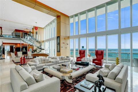 This is an absolutely gorgeous and stunning 10,000 sq. ft. duplex in the sky with 180 degree views of Biscayne Bay, Miami Beach, Fisher Island, Key Biscayne and beyond and city scape views from the west side. The terrace and pool comprise of 4394 sq....