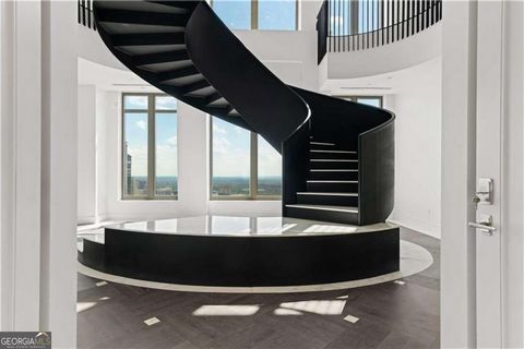 Were a Penthouse a masterclass symphony, this luxurious skyrise domicile would be considered the absolute *Magnum Opus*. Commanding two (2) full floors atop the Extraordinary & Iconic Waldorf Astoria Hotel in the very heart of Buckhead...Harrison Des...