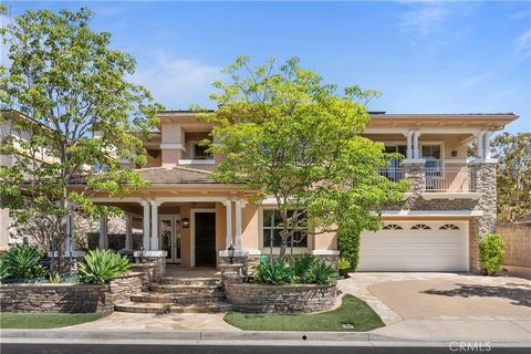 This elegant home in the Dove Canyon Community boasts 4 bedrooms, 4 bathrooms, and multiple living spaces including a family room, game room, office, and loft. Updated in 2019-2020, it features an open concept floor plan with vaulted ceilings, a mode...