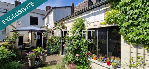 Maison centre-ville avec dépendance et jardin.