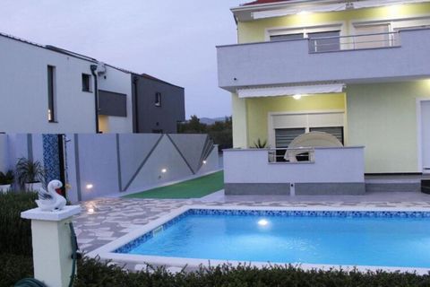 Villa Ava is located in Šibenik, Croatia. Children's playground, kids outdoor play equipment, gym as well as fitness equipment are at your disposal, which makes this place ideal for a nice and relaxing family or friends vacation. Note : Private parki...