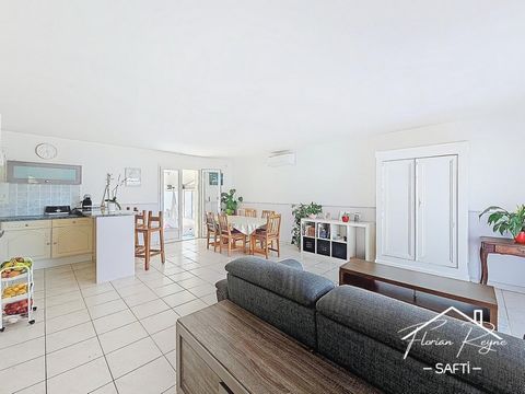 Au calme, maison lumineuse avec piscine et belle véranda.