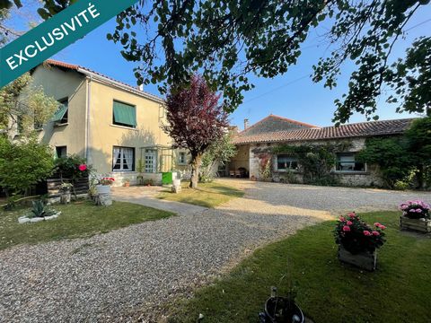 Magnifique propriété comprenant maison de village et dépendances