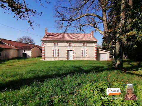Façade en pierre apparente, toiture refaite, jardin clos
