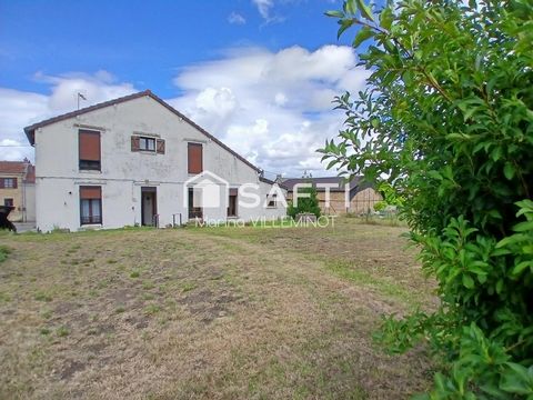 maison avec garage et beau terrain
