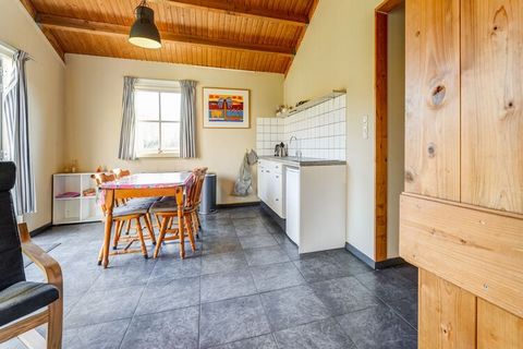 You will find the peace and space of the countryside in Lage Zwaluwe. This pretty holiday home has a bedroom and a sleeping niche for 6 guests. This is a perfect home for a campsite adventure. Take your family along and enjoy this wonderful land. The...