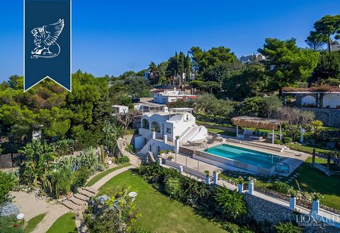 Spectacular luxury villa in Anacapri (Capri). Mediterranean vegetation and a few steps from the historic center of Capri, this residence is a corner of privacy and tranquility. With an internal total surface of approximately 30 sqm, the property for ...