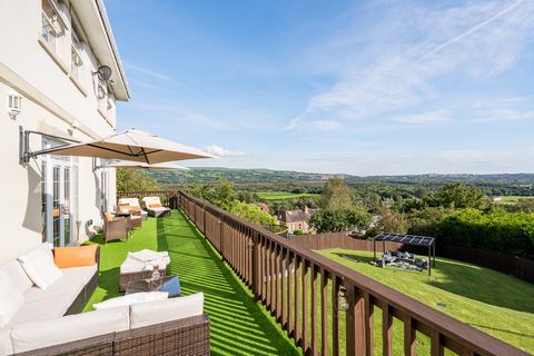 An exceptional detached six-bedroom family home finished to a superb standard, pleasantly positioned with impressive vistas of the Welsh countryside and across Swansea. 1 Clos Aaron is a luxurious, stylish home situated within a cluster of five execu...