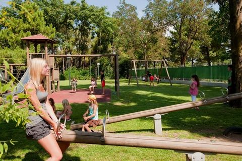 The camping pitches and the various chalets are scattered around the large park in the shade of the pine trees. You can choose from different types of chalets and bungalows at Baia Domizia Camping Village. All types have a lovely terrace with garden ...