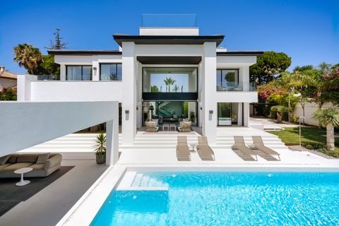 This stunning beachfront villa epitomises luxury living, offering a harmonious blend of contemporary design and exquisite craftsmanship. Spread across four floors, this Villa spans a generous built area of 440m2, with an additional 280m2 of terrace s...