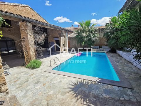 Between land and sea, come and discover this large winegrower's house of 495 m2 tastefully combining stone and wood, 10 minutes from Béziers in a village with all amenities, school and college. A rare opportunity on the market today. Beautiful, brigh...