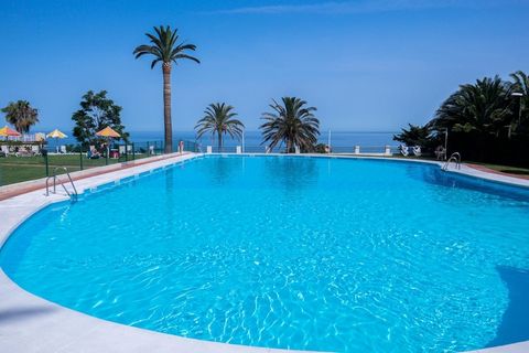 Discover a serene coastal retreat in the heart of Torremolinos, where the Mediterranean Sea serves as your daily backdrop. This elegant apartment offers an ideal setting for couples, small families, or remote workers seeking both relaxation and inspi...