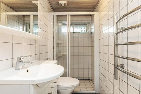 Close to the beach in a cosy cottage area is this holiday cottage on a large plot with a south-west faced garden. The house has a large kitchen with all amenities required, bright bathroom with shower cubicle, 3 large bedrooms and a large panoramic l...