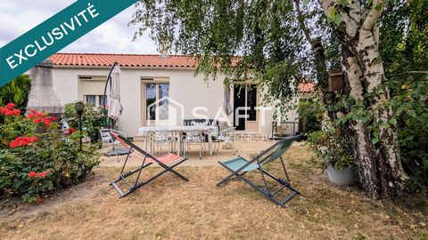 Maison chouchoutée avec garage et joli jardin