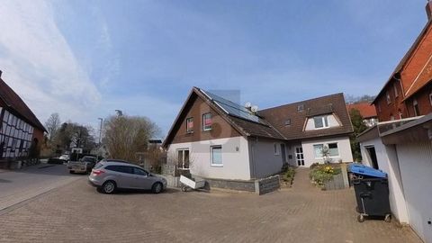 This spacious apartment building offers space for the whole family. With 12 rooms and a living space of 350 m², there is enough space for individual design options. Step-free access, the stream in front of the door and the large garden with terrace a...