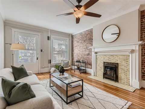 Timeless character and beauty in the heart of Capitol Hill! Step inside this sought after second floor unit which is flooded with original charm and classic architecture. Gorgeous exposed brick walls and hardwood wood floors compliment the high ceili...