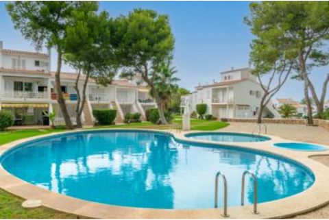 This charming apartment, located in Port d'Addaia, can accommodate up to 4 people. In the beautiful gardens of the property, you will find a large swimming pool of 18 x 8m and a depth range between 1.05m and 1.8m. In addition, there is a children's p...