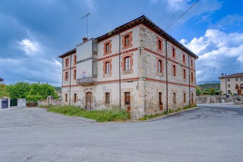 IT IS URGENT TO SELL. The building is located in the village square of the municipality of Narbaiza where the rural houses flourish successfully. The beautiful façade is reminiscent of the industrial buildings of the Victorian era. It has three floor...