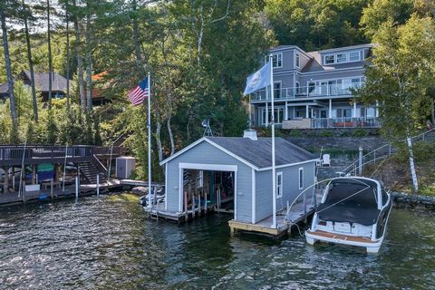 Incredible Winnipesaukee home in a great neighborhood with a much sought after Boathouse (33x18) and a 4+car garage with amazing family room in extra building across the street on extra lot! This house has it all, wonderful floor plan, quality materi...