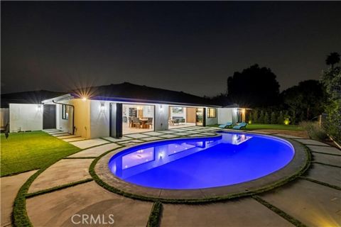 This exceptional single-story residence is strategically located south of Ventura Blvd, offering a haven of contemporary seclusion. With 3139 sq ft of living space on a 20, 330-square-foot lot, this 5-bed, 4-bath masterpiece was built for the owner, ...