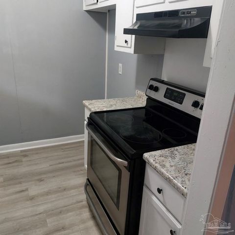 Beautiful, remodeled townhome with 2 bedrooms 1.5 bath. New flooring throughout with updated kitchen featuring new appliances, new flooring, and fresh paint throughout the entire unit. Features: - Air Conditioning