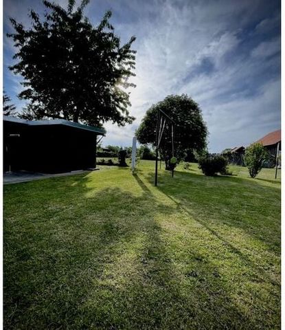 Maison de vacances confortable dans la belle région de vacances Fleesensee avec jardin et terrasse, 70 m² pouvant accueillir jusqu'à 4 personnes.